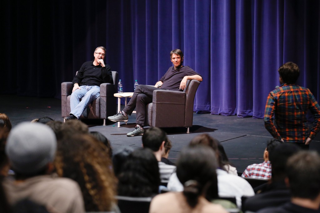 Vince Gilligan (l) answers student questions in a Q&A moderated by Interim Dean David Bridel (r). (Photo by Ryan Miller/Capture Imaging)