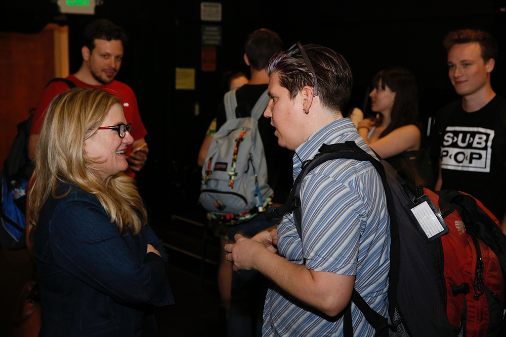 Nancy Cartwright talking to a student