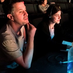 Photo: Director Jeff Maynard, left, sits at the tech table with Stage Manager Kelly Merritt.