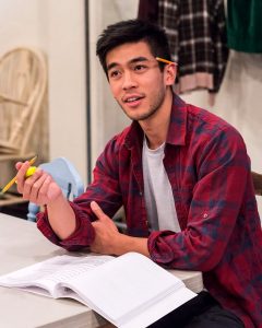Justin Chien in rehearsal for Valley of the Heart