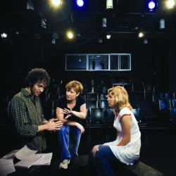 Photograph of Charlotte Cornwell coaching students in the Massman Theatre.