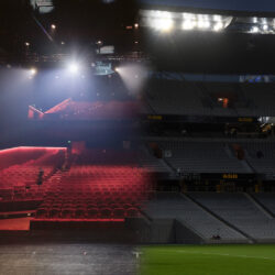 Theatre stage view of an empty house that blends into a stadium field that looks out into the empty stands