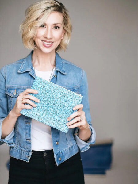 Jennifer Wheeler Kahn holding a Scenery Bags purse