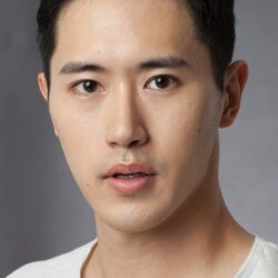 A headshot of actor Jinwoo Jung.