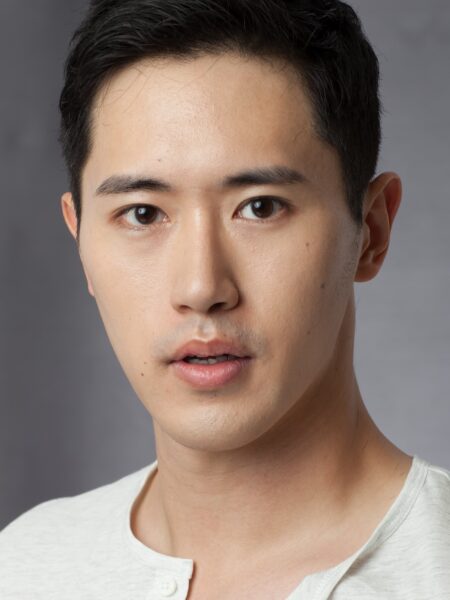 A headshot of actor Jinwoo Jung.