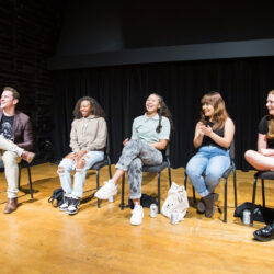 Michael Schwartz, Princess Isis Lang, Storm Reid, Amanda Angeles, and Clare Foley sitting on a stage