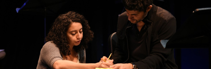 photo of playwright giving actor notes