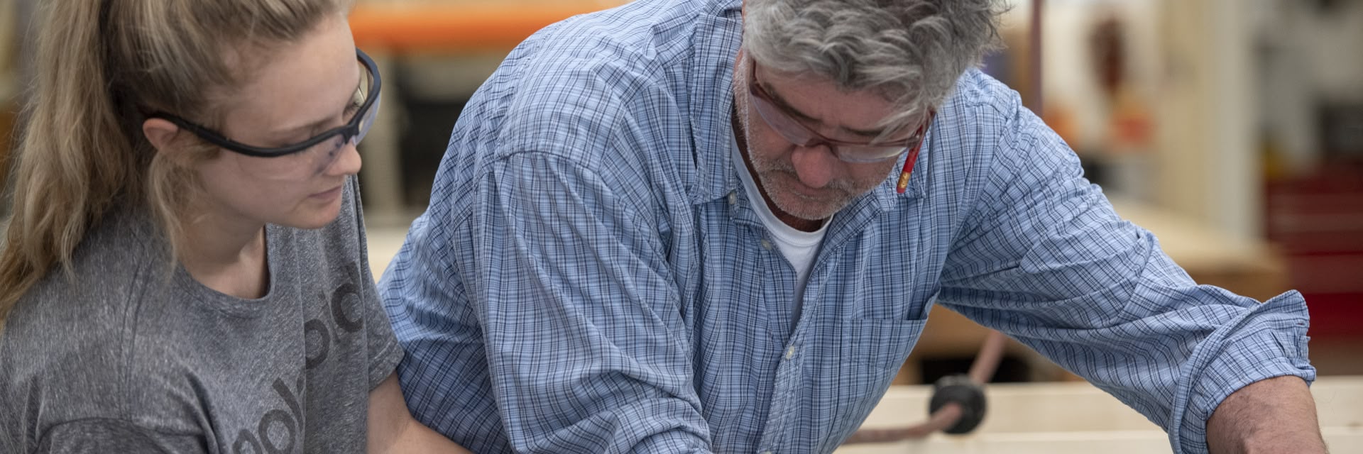 Image of two people building a set