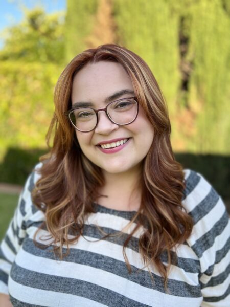 Headshot of Summer Grubaugh smiling at the camera.