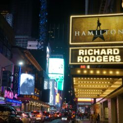 Photo of Broadway street with a sign advertising Hamilton.