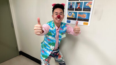 Comedy Performance minor Phong Doozy dressed as a medical clown.