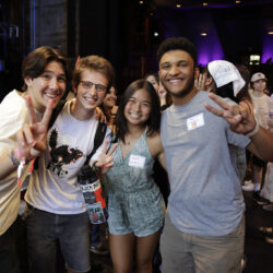 Four students smiling