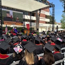 Photo of people watching commencement 2025