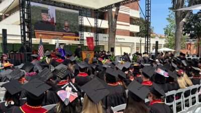 Photo of people watching commencement 2025
