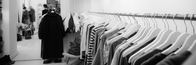 fashion (b/w black and white image of clothing hanging on a rack