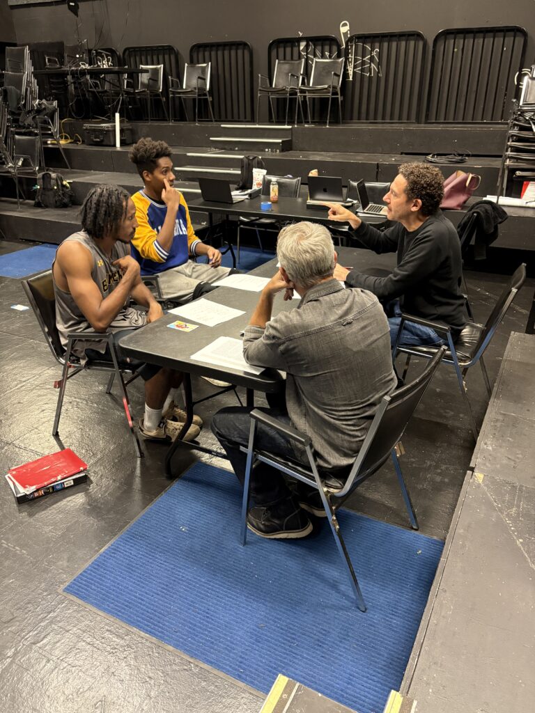 During rehearsals, DJ Kurs works with actors of Pass Over. Left to right: Shawn Anthony, Maurice-Aimé Green, James Foster (back to camera), and DJ Kurs.