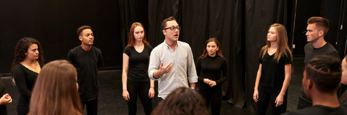 photo of playwright giving actor notes